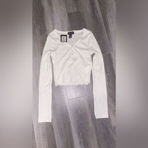 Streetwear Society/ Urban Planet - Buttoned in the front with frill ends